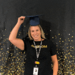 Ms. Chambers tossing a graduation cap